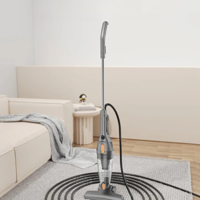 Aspirateur a la main proche fauteuil