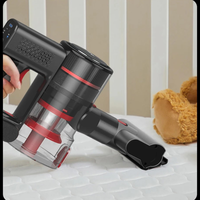 Aspirateur balai sans fil dans berceau