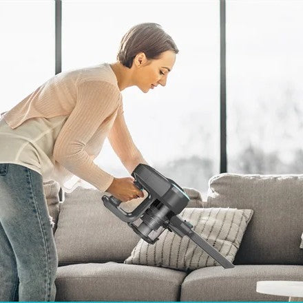 Aspirateur balai sans fil fauteuil