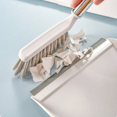 Pelle et balayette ramassage papier